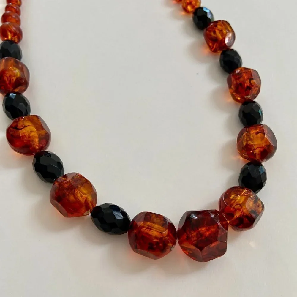 Orange and black beaded necklace